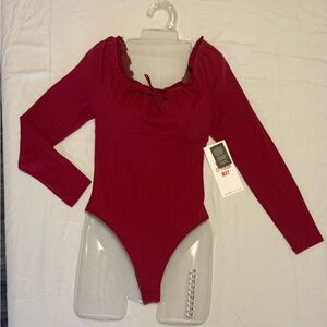 Celebrity Pink Ribbed Long Sleeve Bodysuit in Burgundy